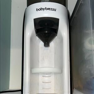 Baby Brezza Formula Dispenser in Black and White